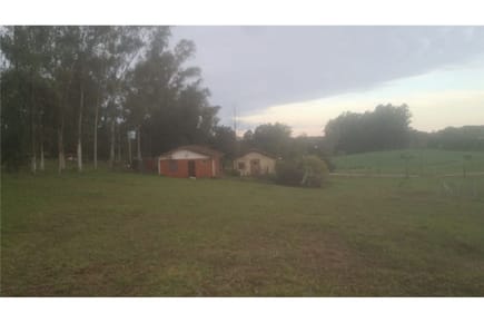 TERRENO CON CONSTRUCCION. COLONIA OBLIGADO km 12