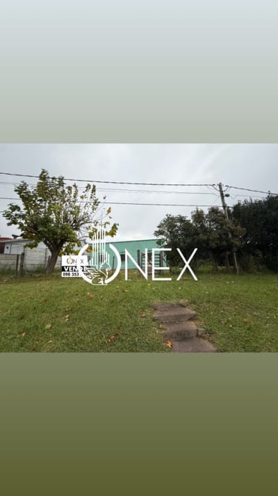 Se vende terreno con mejoras en Barrio Torres en Tacuarembó