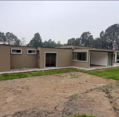 Venta terreno en Condominio Pachacamac con casa