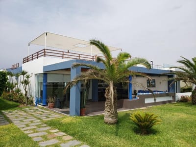 Venta amplia y hermosa casa en 1ra fila playa Cocoa en Asia  km 99.5