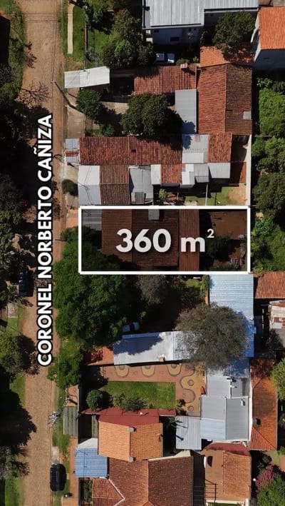 VENDO TERRENO CON DOS CASAS EN SAN LORENZO