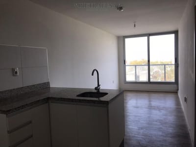 Apartamento en venta con renta 2 dormitorios, 1 baño, balcón y garaje - Canelones, Cordón.