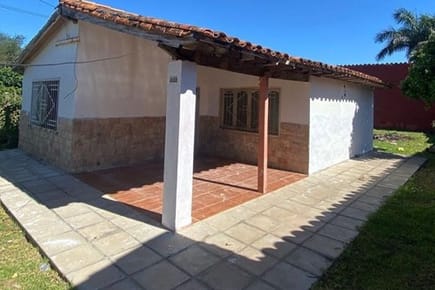 Terreno con 2 Chalets Independientes en Limpio