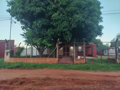 VENDO CASA EN DOS TERRENOS EN AREGUA CAACUPEMI