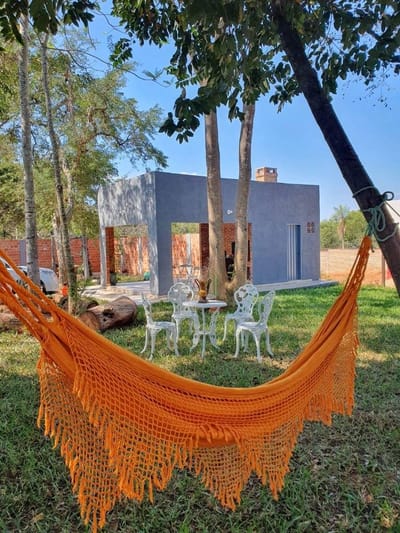 VENDO TERRENO CON QUINCHO EN AREGUÁ