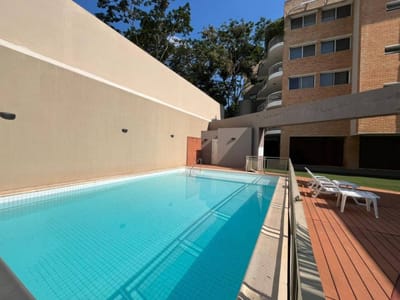 Vendo amplio departamento 3 habitaciones 2 cocheras Edificio MANORA