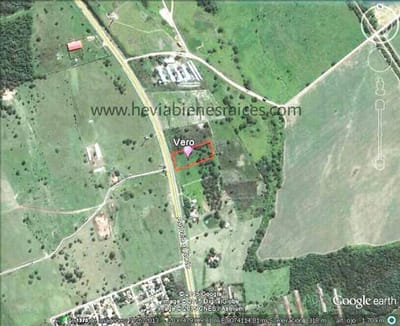 VENDE TERRENO SOBRE CARRETERA ENTRE WARNES Y MONTERO