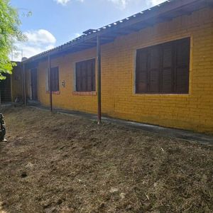 Vendo Terreno De 1000 M2 Sobre Ruta Interbalnearia Con Casa De 3 Dormitorios Y 2 Baños