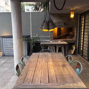 Apartamento De 1 Dormitorio Con 1 Gge, Estufa A Leña, Y Patio Con Parrillero