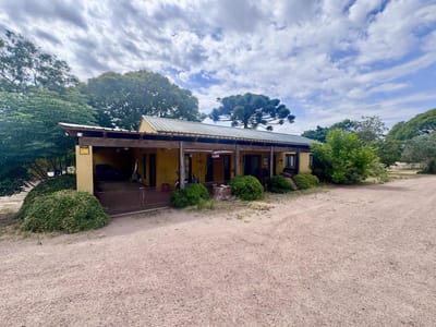 Chacra en venta con casi 7 hectáreas casa laguna y arroyo